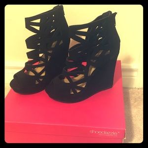 Platform high wedge heels.